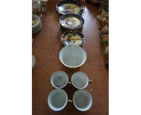 A handpainted part tea service decorated with figures on camels, possibly Noritake.