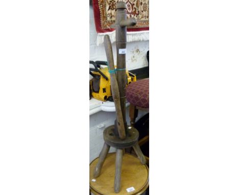 A vintage fruitwood dolly peg.
