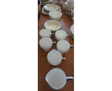 A Royal Grafton bone china Art Deco tea service painted with vibrant colours.