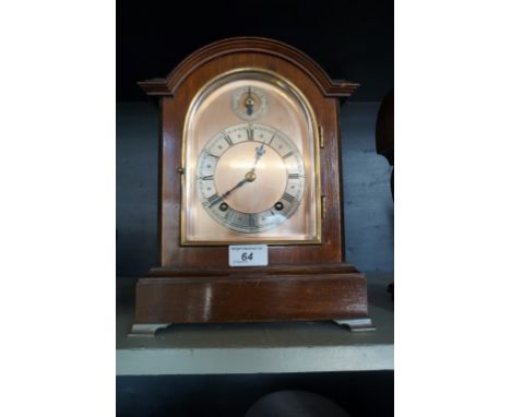 An Edwardian mahogany bracket clock.