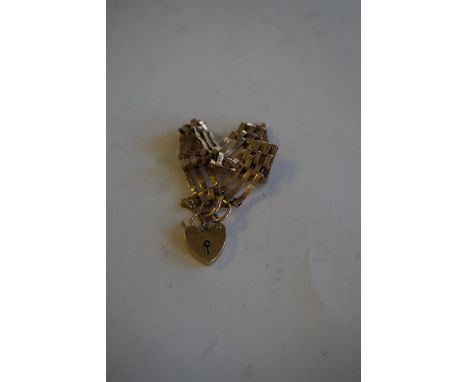 A 9ct gold gate link braceletWith heart padlock, weight 9.5g