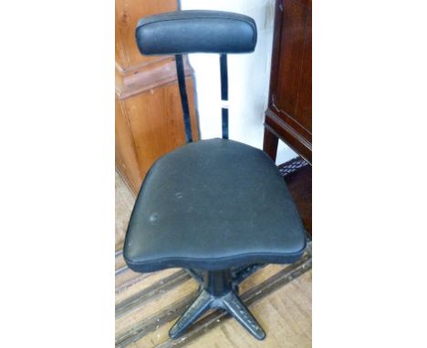A vintage Singer sewing machine chair.