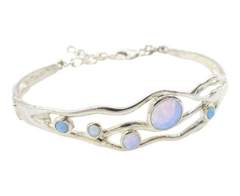 Silver opal openwork bracelet, stamped 925Condition Report:Max length = 18.5cm, max depth = 1.5cm, good condition