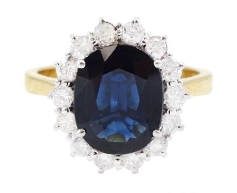 18ct gold oval cut sapphire and round brilliant cut diamond cluster ring, sapphire approx 3.30 carat, total diamond weight ap