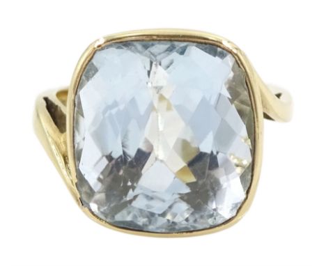 9ct gold single stone cushion cut blue topaz ring, London 1987Condition Report:Approx 6.8gm, size L-M, max depth = 14.5mm x 1