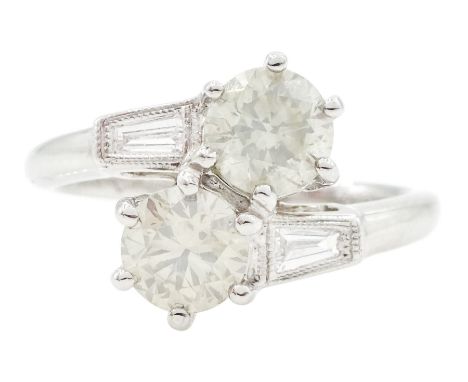 18ct white gold two stone round brilliant cut diamond crossover ring, with tapered baguette diamond shoulders, hallmarked, to