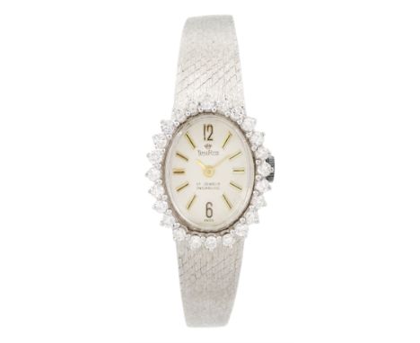 TimeRite ladies 14ct white gold manual wind wristwatch, silvered dial and round brilliant cut diamond bezel, on integral 14ct