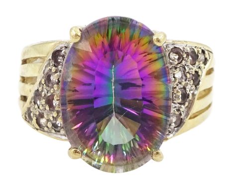 9ct gold oval cut mystic topaz ringCondition Report:Approx 5.2gm, tested 9ct, size J-K, max depth = 14mm