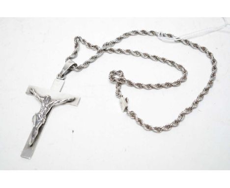 A Mexican silver crucifix pendant, on a Mexican silver chain necklace.