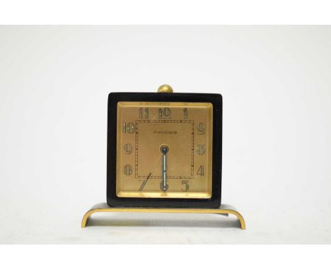 A Jaeger LeCoultre black lacquered bedside alarm clock, 6.5cms high.