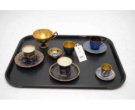 A selection of gilt decorated tea and coffee cups, including: Shelley late Foley miniature tea cup and saucer, with swallow d
