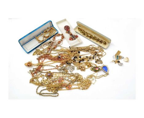 A selection of costume jewellery including gold-coloured chain necklaces. 