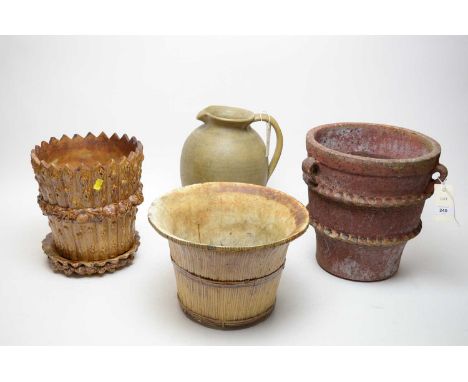 A Hillstonia studio pottery jug; together with a stoneware jardiniere or planter; and two naturalistic majolica style planter
