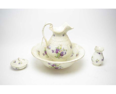 A Bishop &amp; Stonier porcelain violet flower wash set, comprising: ewer and basin; vase; and lidded soap dish; together wit