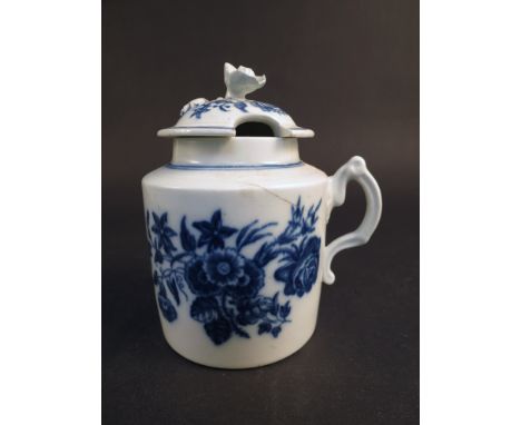 An 18th Century Caughley blue and white porcelain preserve pot with floral encrusted lid and stylised handle, hairline cracks