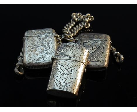 Three 19th Century and Edwardian silver match vesta cases including 1903 and 1906, together with a silver fob chain (4)