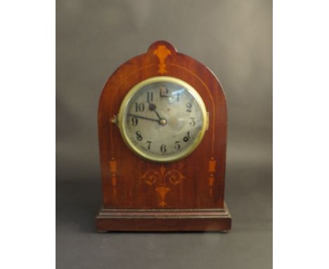 An Edwardian mahogany and inlaid mantel clock, silvered Arabic dial with 8 day striking movement and slow/fast adjuster 