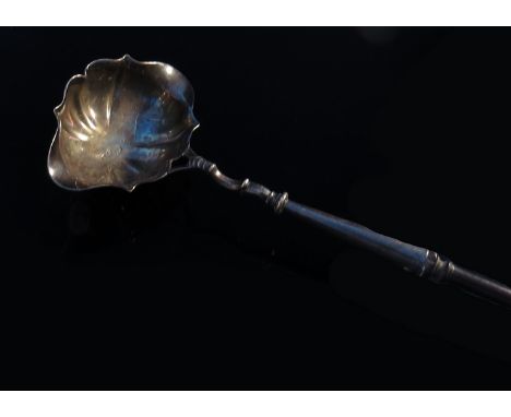 A Georgian silver spirit ladle with twin pourer, turned hardwood handle 