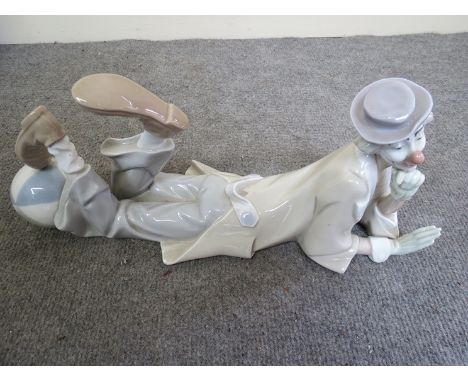 A Lladro figure of recumbent clown, 38cm long 