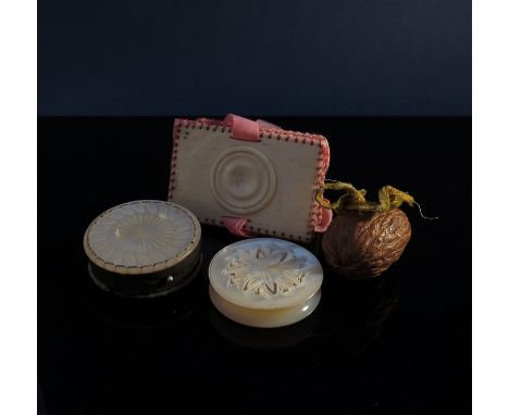 Victorian sewing items to include mother of pearl pin cushion, lidded container, bone needle case and a walnut pin cushion (4