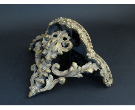 An Edwardian ornate serpentine wall bracket with gilt acanthus detail, beaded detail, 27cm long x 17cm high 