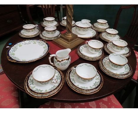 A Royal Crown Derby tea service with grape and vine detail, approx 40 pieces