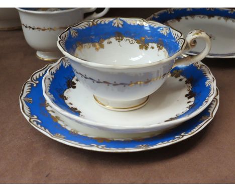 A Rockingham style tea service with blue border and gilt detail, some pieces marked Coalport, approx 47