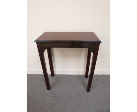 A George III style mahogany lamp table with pierced spandrels over chamfered square legs 