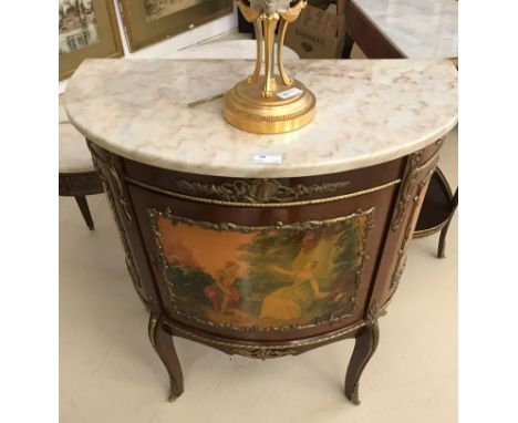 A Louis XVI-style marble-topped fronted commode
