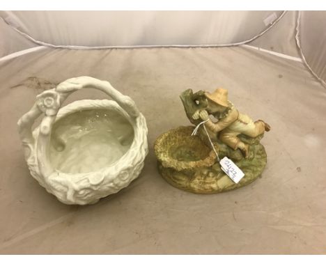 A Royal Worcester boy with horn figure and blanc de chine basket