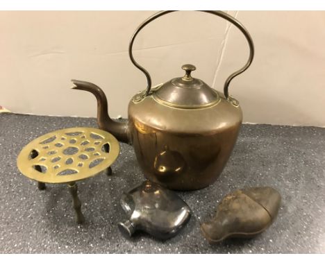 A copper kettle; together with a trivet, leather-covered hip flask and an EPNS hip flask