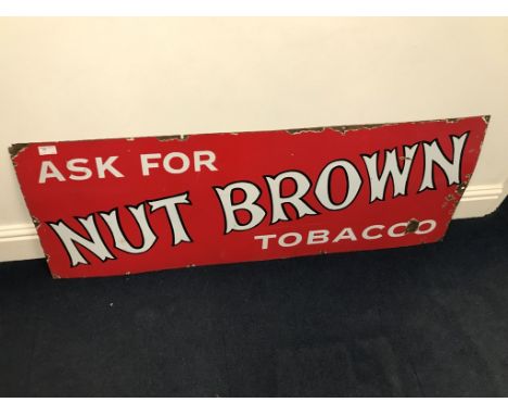 An enamel Nut Brown tobacco tin sign: H45cm x W122cm
