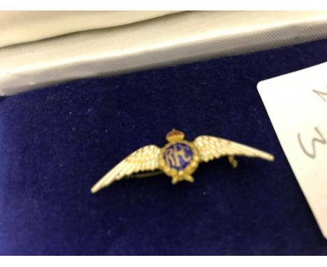A 9ct RFC enamel badge: maker's mark 'TLM'