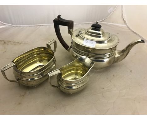 A HM Silver matching three-piece tea service, by two makers