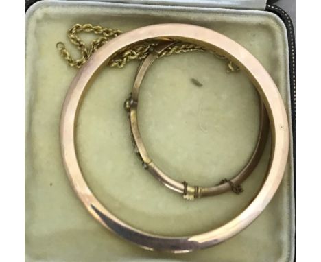 A 9ct gold bangle and bracelet; together with one other