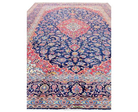 FINE PERSIAN KASHAN CARPET, 392cm x 301cm. 