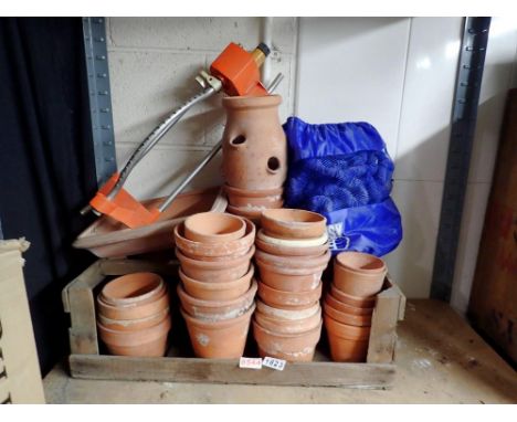 Wooden tray of mixed terracotta plant pots including strawberry pot, hose reel and water sprayer. Not available for in-house 