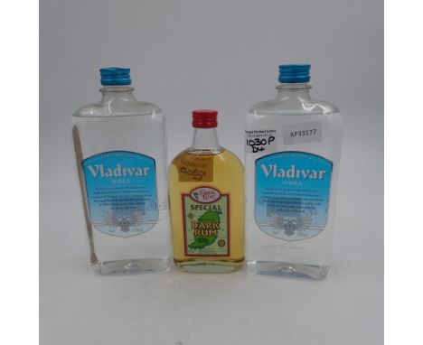 Two 1 litre bottles of Vladivar Vodka and a 375ml Clarke Court Special Dark Rum 42%. Not available for in-house P&amp;P 