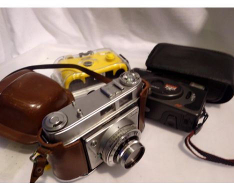 Three cameras, including Praktica and Kodak. Not available for in-house P&amp;P