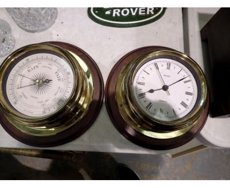 Mounted brass clock and barometer. Not available for in-house P&amp;P 