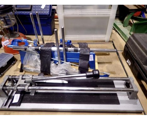 Tenon saw and a tile cutter. Not available for in-house P&amp;P 