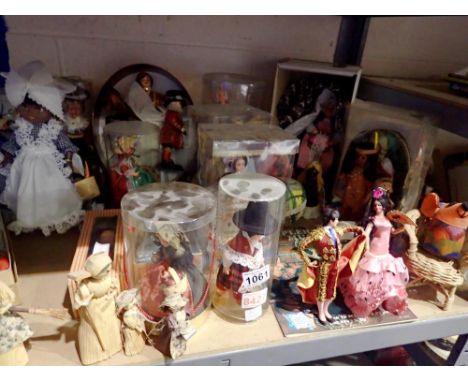 Shelf of mixed vintage dolls to include a Bruges " The Little Lace Shop " example. Not available for in-house P&amp;P