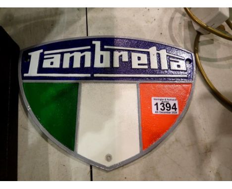 Cast iron Lambretta wall plaque, L: 29 cm. UK P&amp;P Group 2 (£20+VAT for the first lot and £4+VAT for subsequent lots)