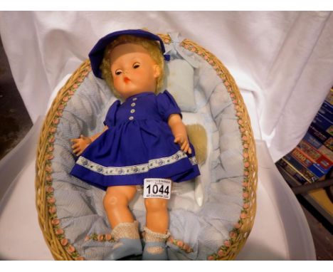 Cinderella doll with sleeping eyes in a floral basket. Not available for in-house P&amp;P 