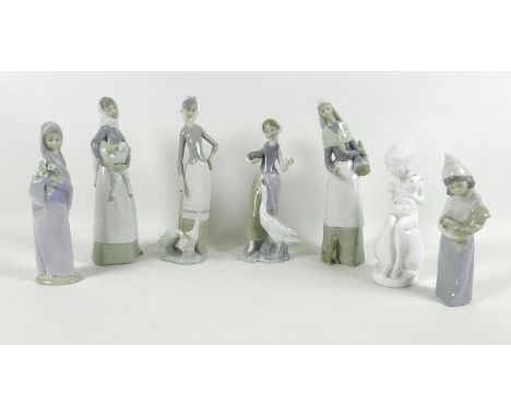 A group of six Lladro figurines, comprising Girl with Lamb, number 4584, designed by Antonio Ruiz, 27.5cm, Lady with Two Gees