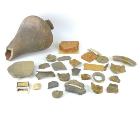 A group of archaeological finds, including an amphora (possibly Roman), a/f, 21 by 36cm high, together with other purported R