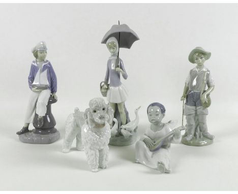 A group of five Lladro porcelain figures, including Fisherboy, number 4809, 21.5cm high, Boy with Yacht, modelled by Salvador