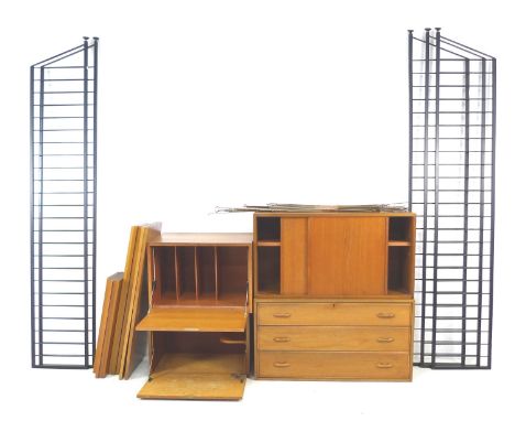 A set of Ladderax, Staples, adjustable shelving units, with four storage, desk and drawer units, nine shelves, and five ladde
