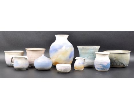 A selection of retro 1960s / 70s studio art pottery with multiple vases, planters / plant pots, jugs ect. All most with light