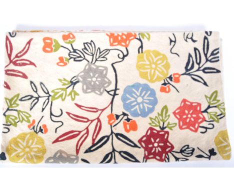 A decorative retro vintage 20th Century wall hanging / throw having stitched multi coloured floral decoration flanked by furt